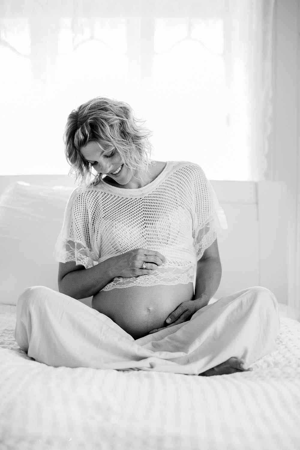 Gravid fotograf. Graviditet er et smukt stadie i en kvindes liv